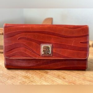 Dooney & Bourke red leather envelope clutch with shoulder strap